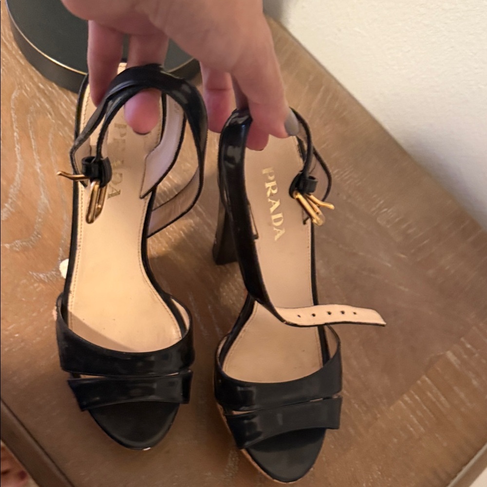 Prada Elegant Black and Gold Heels